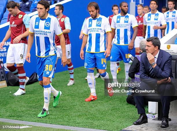 Brighton manager Oscar Garcia watches his Brighton team as they make their way onto the pitch during the Sky Bet Championship match between Brighton...