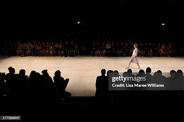 Model showcases designs by Jayson Brunsdon on the runway at the MBFWA Trends show during Mercedes-Benz Fashion Festival Sydney 2013 at Sydney Town...