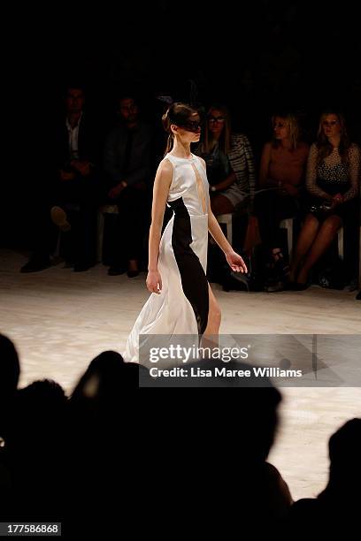 Model showcases designs by Christina Exie on the runway at the MBFWA Trends show during Mercedes-Benz Fashion Festival Sydney 2013 at Sydney Town...