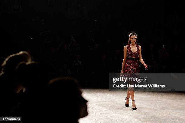 Model showcases designs by Camilla and Marc on the runway at the MBFWA Trends show during Mercedes-Benz Fashion Festival Sydney 2013 at Sydney Town...