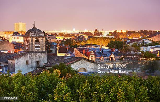 cityscape of montpellier at night - montpellier stock pictures, royalty-free photos & images