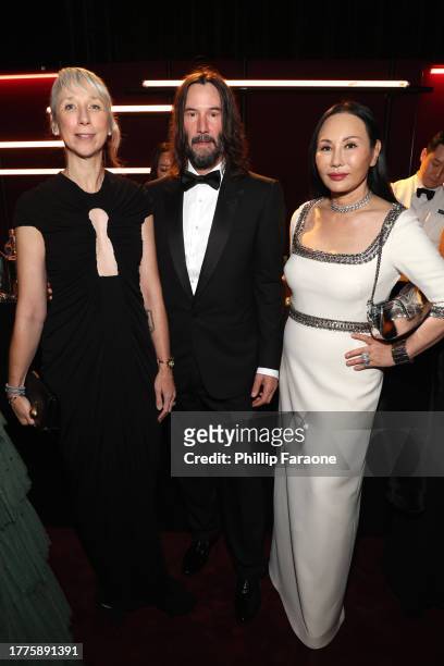 Alexandra Grant, Keanu Reeves, wearing Gucci, and LACMA Art + Film Gala Co-Chair Eva Chow, wearing Gucci, attend the 2023 LACMA Art+Film Gala,...
