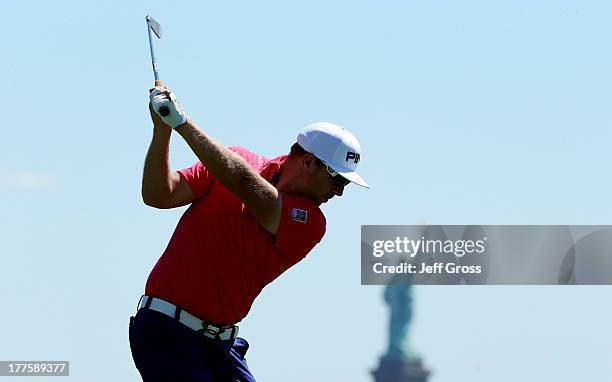 Hunter Mahan of the United States tees off on the second hole during the third round of The Barclays at Liberty National Golf Club on August 24, 2013...