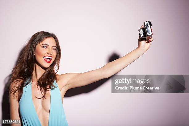 blue swimsuit self portrait - macchina fotografica digitale foto e immagini stock