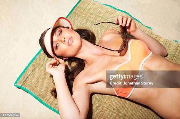 beach bikini - sun visor stock pictures, royalty-free photos & images