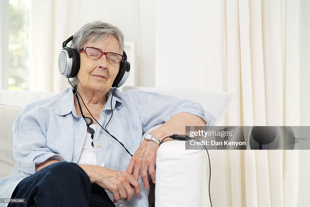 ELDERLY WOMAN GARDENING,READING,SEWING ETC