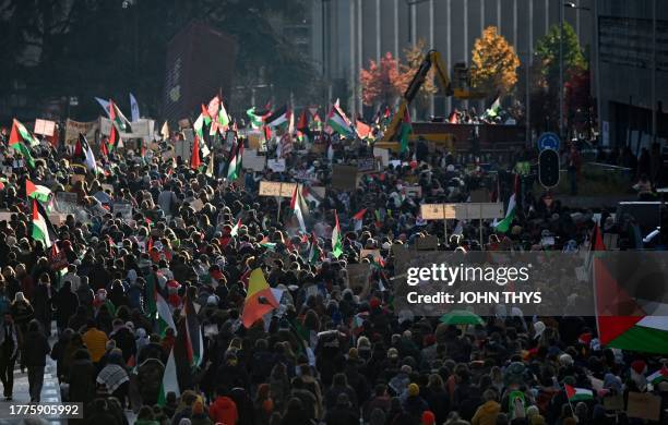 Protesters take part in a demonstration in support of Palestinians and to demand an immediate ceasefire in Gaza at Place de la Republique in...