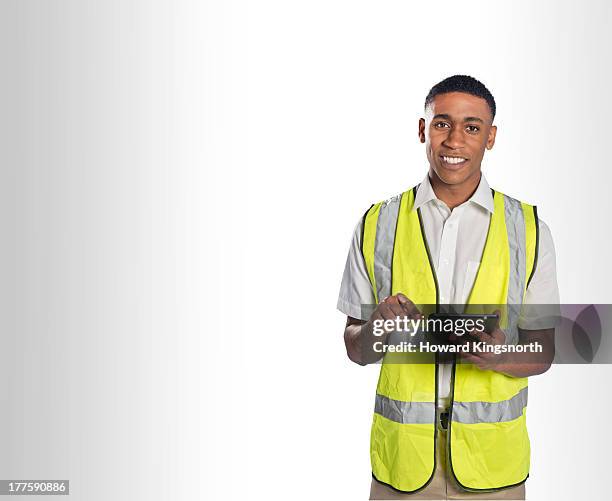 delivery man with tablet - delivery person on white stock pictures, royalty-free photos & images