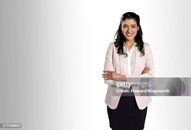 female smiling to camera - women in suits stock pictures, royalty-free photos & images