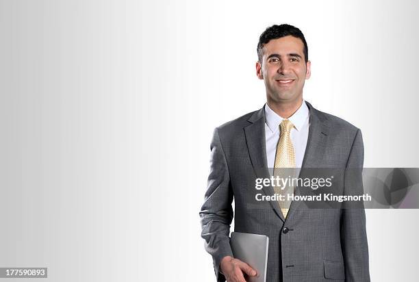 businessman smiling to camera - grey suit foto e immagini stock