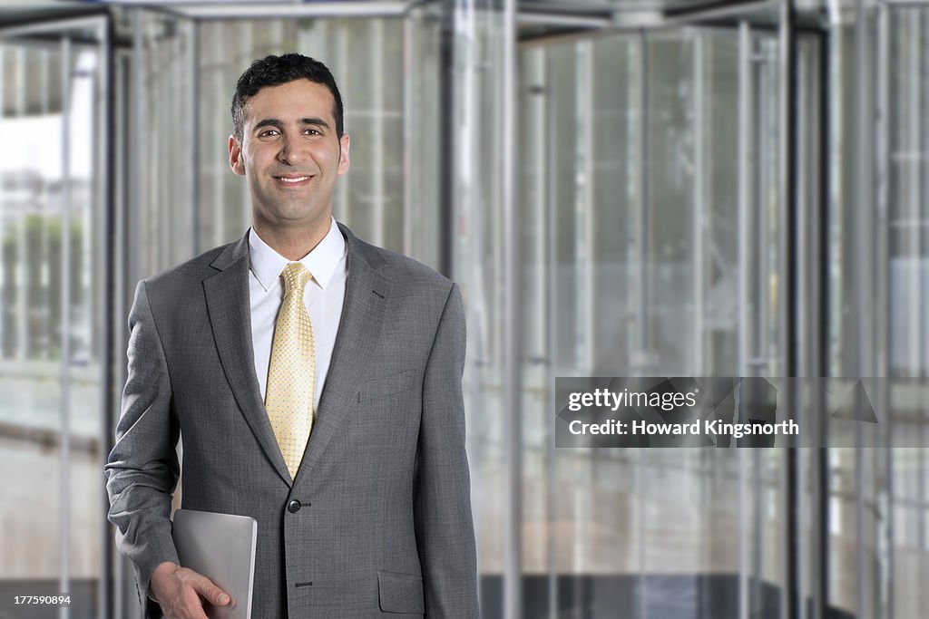 Business man smiling to camera