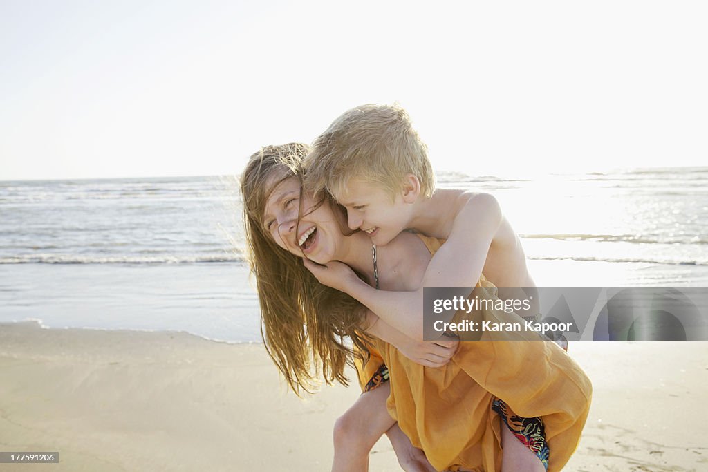 Brother and sister on beach