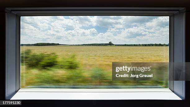 view out of a high speed train - bullet trains stockfoto's en -beelden