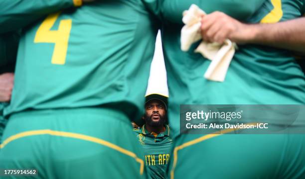 Temba Bavuma of South Africa speaks to their side in the huddle during the ICC Men's Cricket World Cup India 2023 between India and South Africa at...