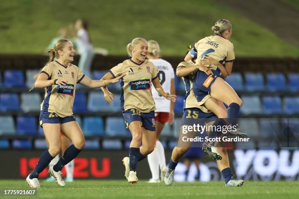 Cassidy Davis of the Jets celebrates a goal with team mates during the A-League Women round three match between Newcastle Jets and Western Sydney...