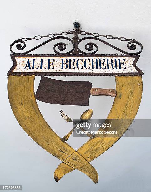 The sign of the Restaurant "Alle Beccherie" is seen on August 24, 2013 in Treviso, Italy. Treviso claims that Tiramisu was invented in the 1960s by...