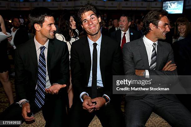 Novak Djokovic of Serbia, Rafael Nadal of Spain and Roger Federer of Switzerlan wait to go on stage during the ATP Heritage Celebration at The...