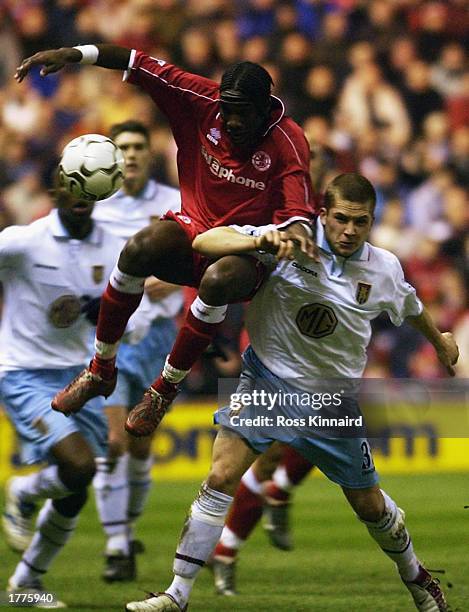 Joseph-Desire Job of Middlesborough tussles with Joey Gudjonsson of Aston Villa for possession of the ball during the FA Barclaycard Premiership...