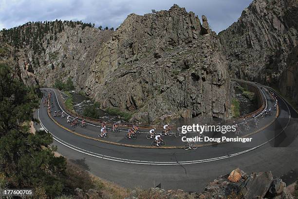 The peloton descends Big Thompson Canyon during stage six of the 2013 USA Pro Challenge from Loveland to Fort Collins on August 24, 2013 in Fort...