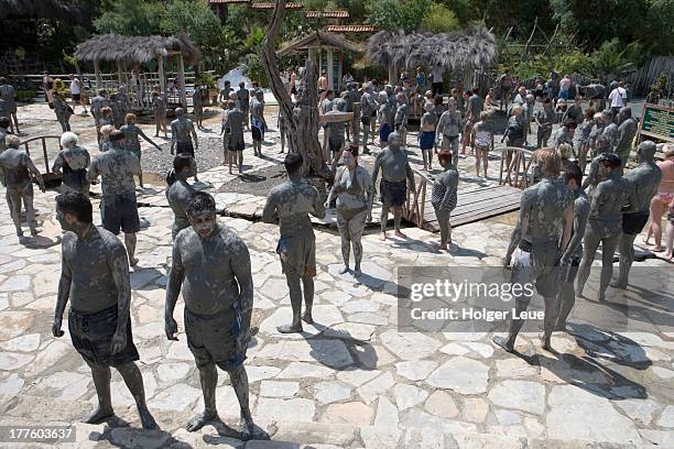 people dry mud at dalyan river mudbaths - schlammbaden stock-fotos und bilder
