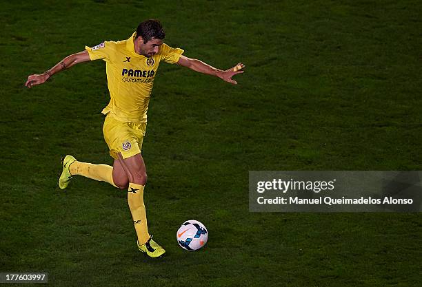 Cani of Villarreal shoots for score the second goal during the La Liga match between Villarreal CF and Real Valladolid CF at El Madrigal Stadium on...