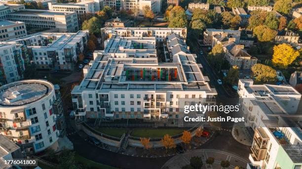 drone view of a city residential development of apartments - cambridge uk aerial stock pictures, royalty-free photos & images