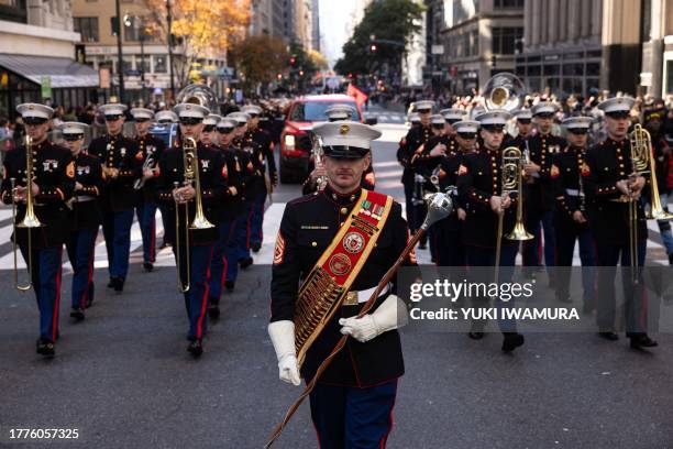 Marine Corps band marches during the annual Veterans Day Parade in New York on November 11, 2023.