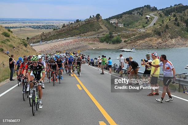 Fans line a climb as the peloton makes its way along Horsetooth Reservoir during stage six of the 2013 USA Pro Challenge from Loveland to Fort...