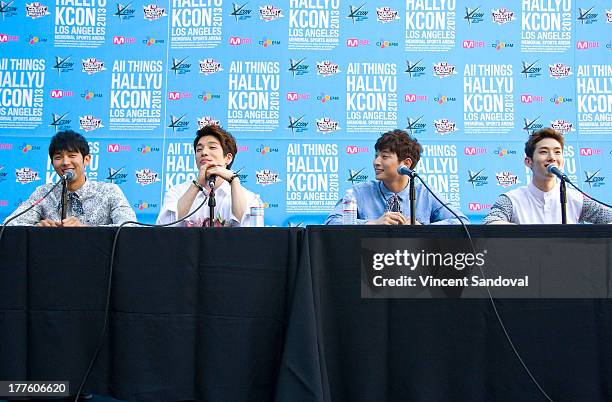 Singers Seulong, Changmin, Jo Kwon and Jeong Jin-Woon of 2am attend the KCON 2013 convention day 1 at the Los Angeles Memorial Sports Arena on August...