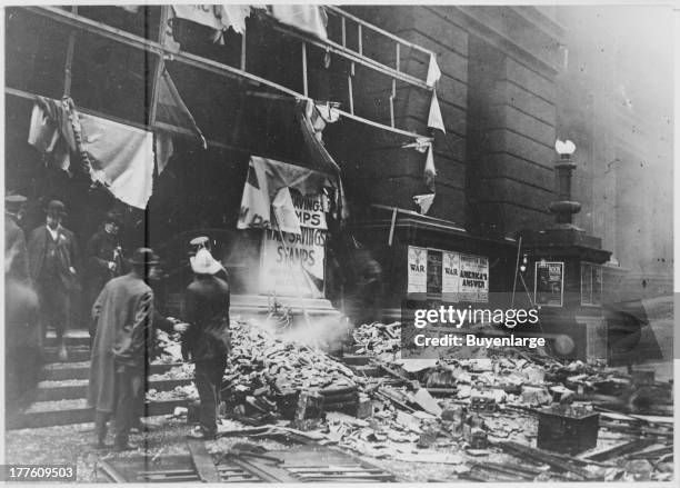 The wreckage of Chicago's Federal Building after the explosion of a bomb allegedly planted by the Industrial Workers of the World as a reprisal for...