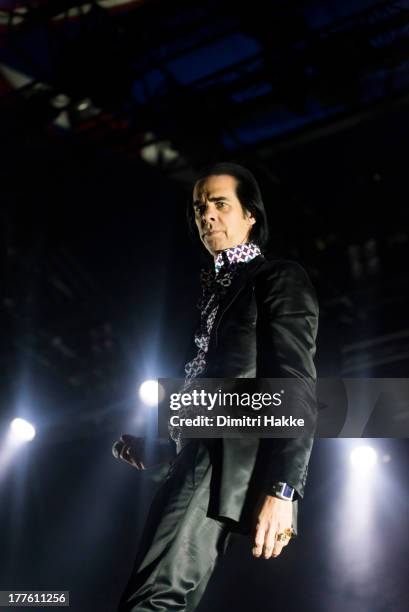 Nick Cave performs on stage on Day 3 of Lowlands Festival 2013 at Evenemententerrein Walibi World on August 18, 2013 in Biddinghuizen, Netherlands.