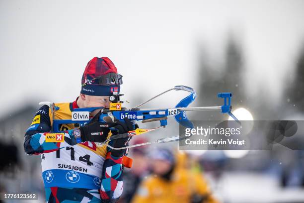 Johannes Thingnes Boe of Norway at the shooting range during the Men 10km Sprint at the Norwegian Biathlon Season Opening on November 11, 2023 in...