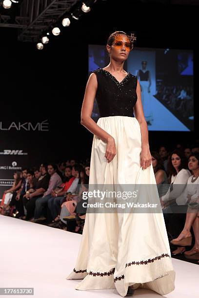 Model showcases designs by Sougat Paul on the runway during day 2 of Lakme Fashion Week Winter/Festive 2013 at the Hotel Grand Hyatt on August 24,...