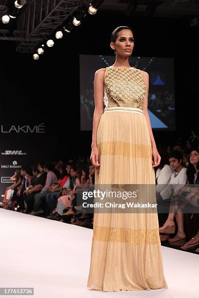 Model showcases designs by Sougat Paul on the runway during day 2 of Lakme Fashion Week Winter/Festive 2013 at the Hotel Grand Hyatt on August 24,...