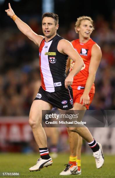 Stephen Milne of the Saints celebrates a goal during the round 22 AFL match between the St Kilda Saints and the Gold Coast Suns at Etihad Stadium on...