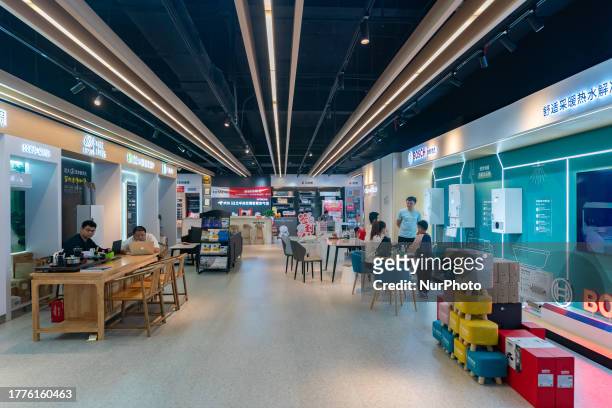 People buy home appliances at the Jingdong Electric Super Experience Store in Chongqing, China, November 11, 2023. It is reported that as of 0:00 on...