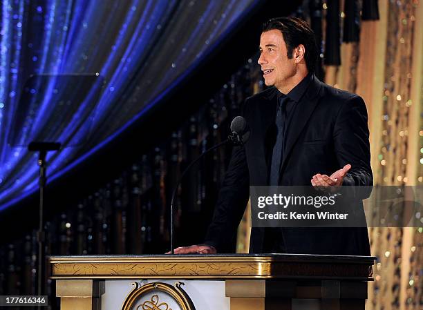 John Travolta attends the Church of Scientology Celebrity Centre 44th Anniversary Gala on August 24, 2013 in Los Angeles, California.