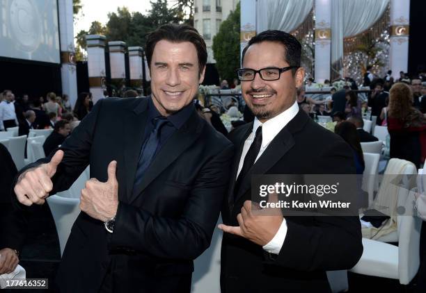 John Travolta and Michael Pena attend the Church of Scientology Celebrity Centre 44th Anniversary Gala on August 24, 2013 in Los Angeles, California.
