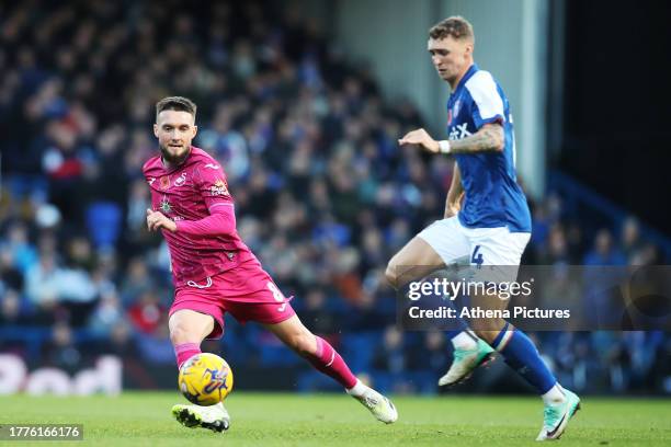 Matt Grimes of Swansea City and Jack Taylor of Ipswich Town in action during the Sky Bet Championship match between Ipswich Town and Swansea City at...