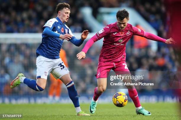 Nathan Broadhead of Ipswich Town chases Liam Cullen of Swansea City during the Sky Bet Championship match between Ipswich Town and Swansea City at...