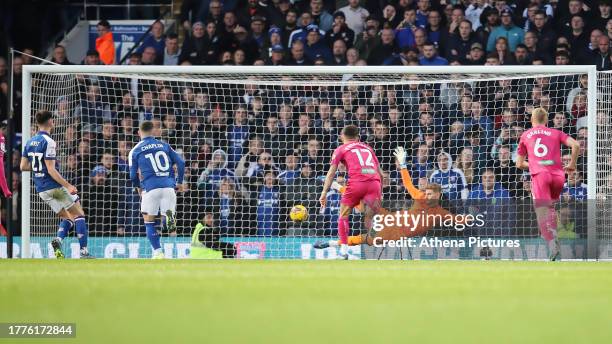 Conor Chaplin of Ipswich Town scores from the penalty spot against Carl Rushworth of Swansea City during the Sky Bet Championship match between...