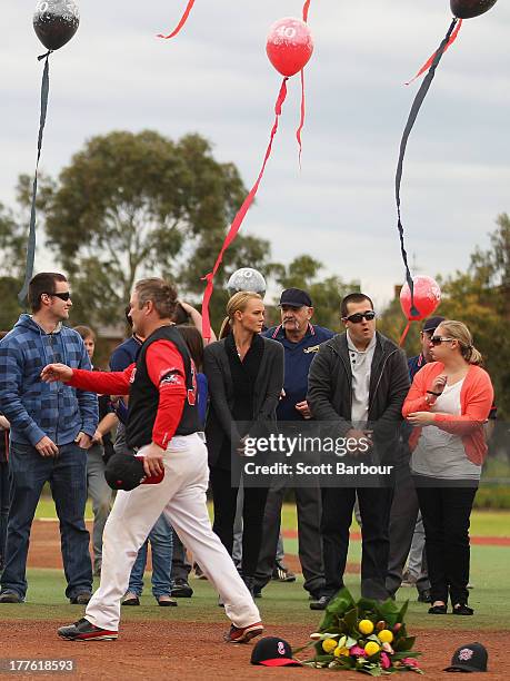 Sarah Harper , the girlfriend of Christopher Lane looks on after releasing balloons to celebrate Lane's life during the Chris Lane Memorial Game at...