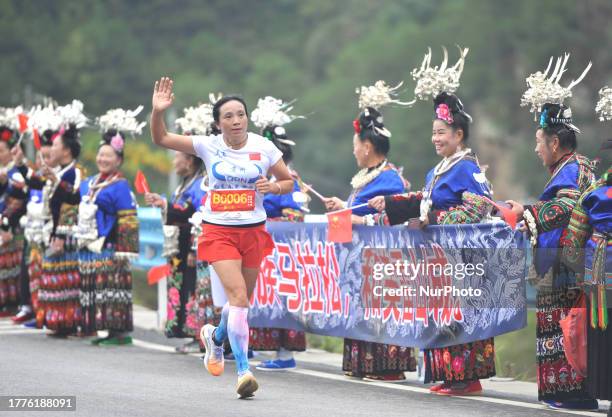 Participants run during the 2023 Guizhou Ring Leigong Mountain Marathon in Leishan county, Qiandongnan, Guizhou Province, China, Nov 11, 2023.