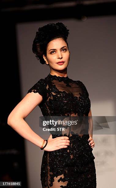 Miss India International 2011, Ankita Shorey showcases a creation by designer Rocky Star on the third day of the Lakme Fashion Week Winter/Festival...