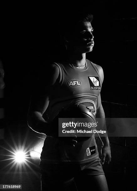 Jaeger O'Meara of the Suns walks out to the ground during the round 22 AFL match between the St Kilda Saints and the Gold Coast Suns at Etihad...