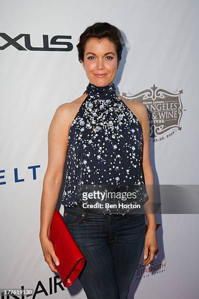 Actress Bellamy Young attends LEXUS Live on Grand hosted by Curtis Stone at the third annual Los Angeles Food & Wine Festival on August 24, 2013 in...