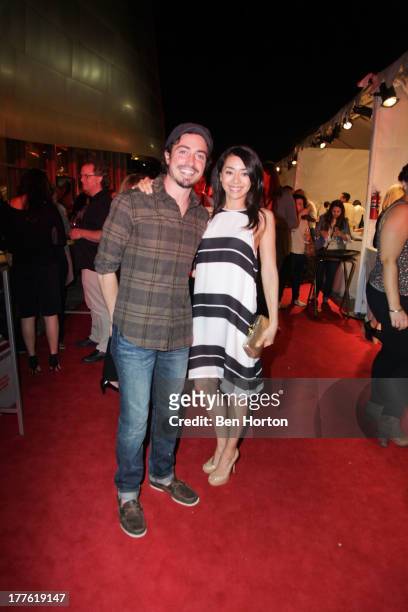Actor Ben Feldman and actress Aimee Garcia attends LEXUS Live on Grand hosted by Curtis Stone at the third annual Los Angeles Food & Wine Festival on...