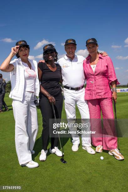 Anja Kruse , Auma Obama, Steffen Goepel, chairman of the GRK Holding, and Suzanne von Borsody take part in the 6th GRK Golf Charity Masters at Golf &...