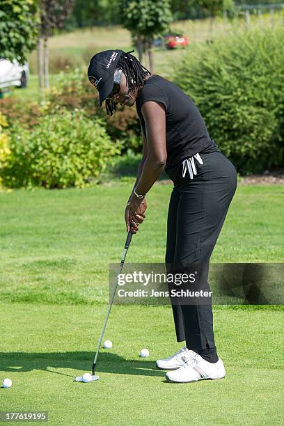 Auma Obama takes part in the 6th GRK Golf Charity Masters at Golf & Country Club Leipzig on August 24, 2013 in Leipzig, Germany.
