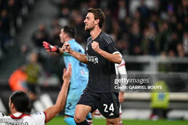 Juventus' Italian defender Daniele Rugani celebrates after scoring the team's second goal during the Italian Serie A football match between Juventus...